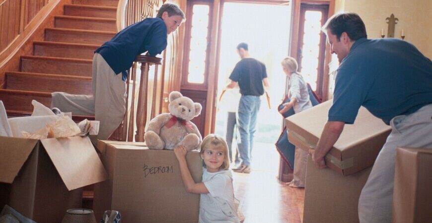 Great Toronto Movers. Professional packing services Toronto. A happy family having their items packed.