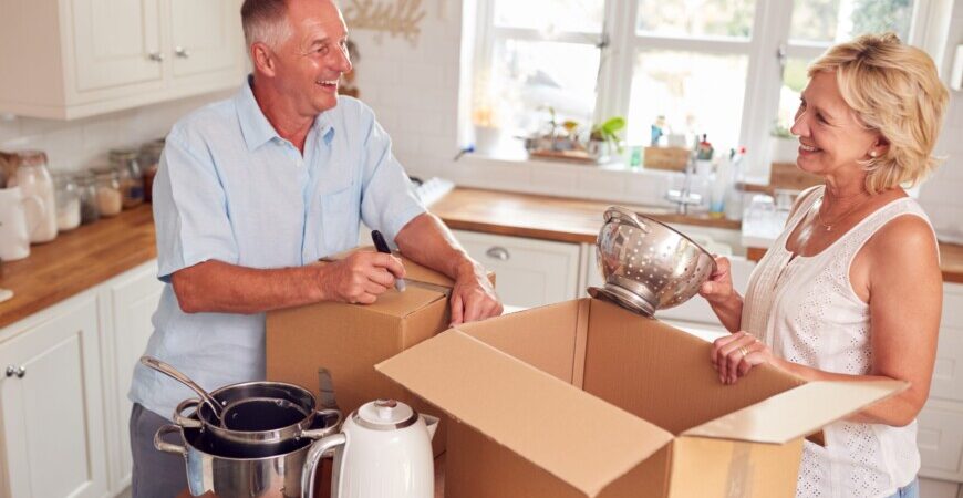 Great Toronto Movers. The right tools for professional senior moving services Toronto. Senior couple unpacks their kitchen boxes.