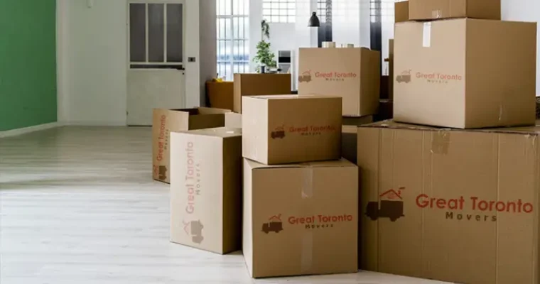 A stack of boxes in the living room packed by moving company in Toronto.