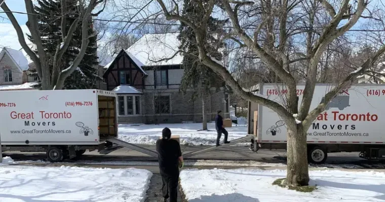 Professional Toronto movers from Great Toronto Movers loading residential items into a truck during a condo move in Toronto.