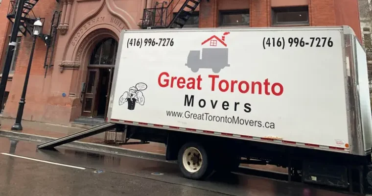 A moving truck from Great Toronto Movers outside a downtown Toronto office, showcasing expert office relocation by local Toronto movers.